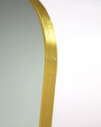 Arch freestanding mirror in gold