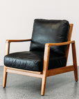 Yukon leather armchair in black/natural