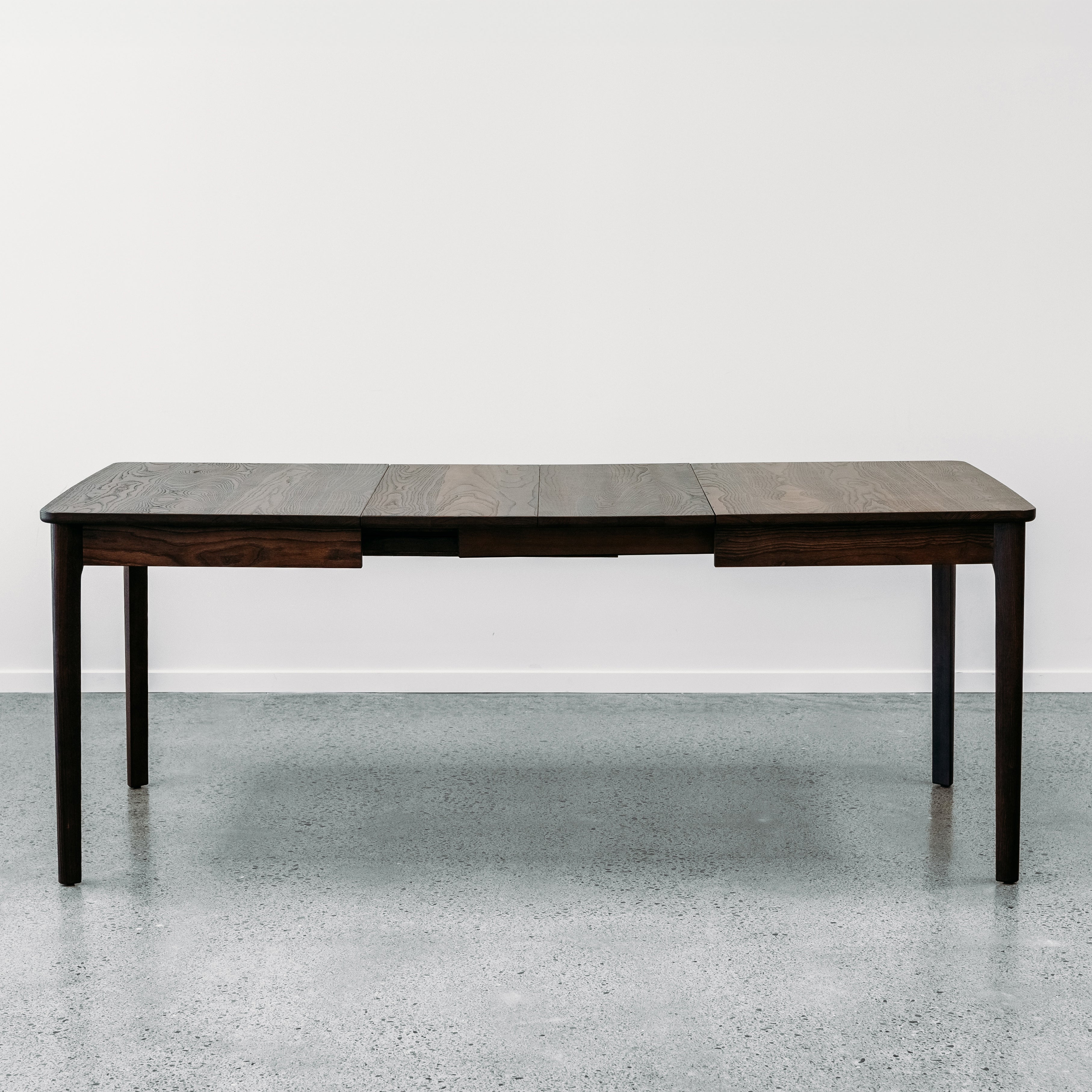 Ghost twin leaf extension table