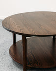 Ghost round coffee table with shelf