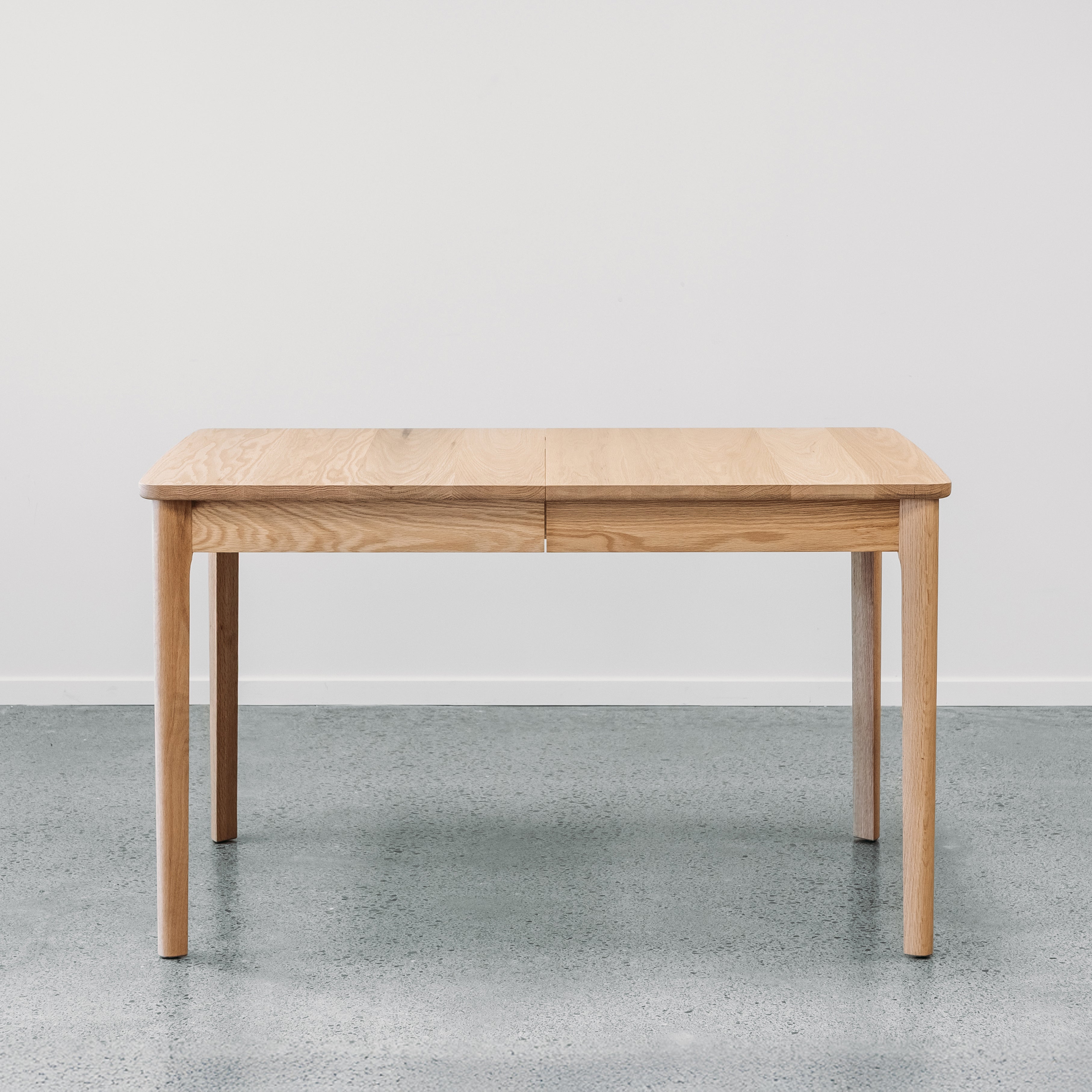 Ghost Dining Extension table in red oiled oak