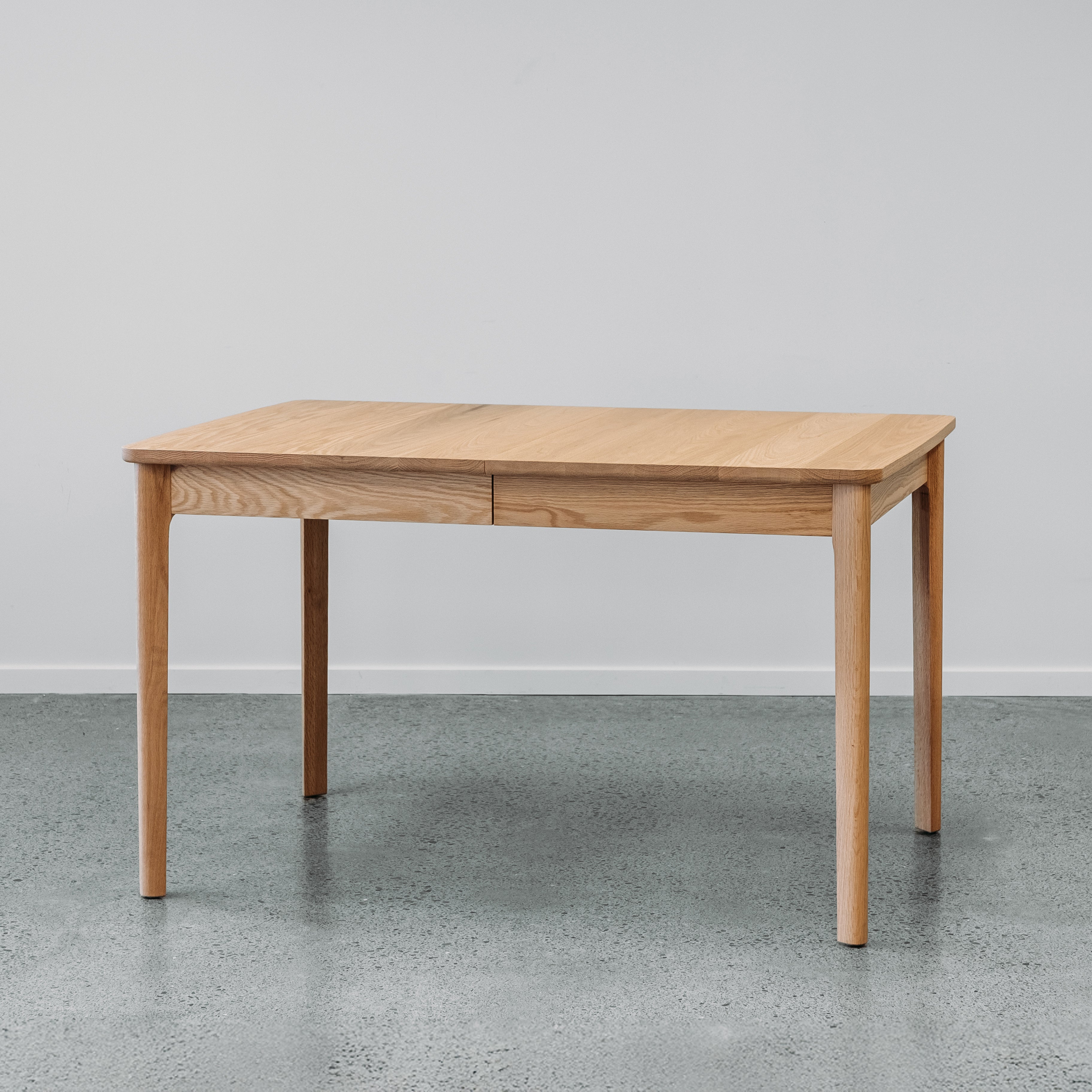 Ghost Dining Extension table in red oiled oak