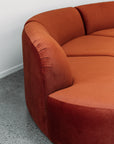 Hendricks Modular curved sofa in ankara terracotta