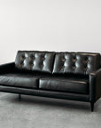 Chanel black leather sofa