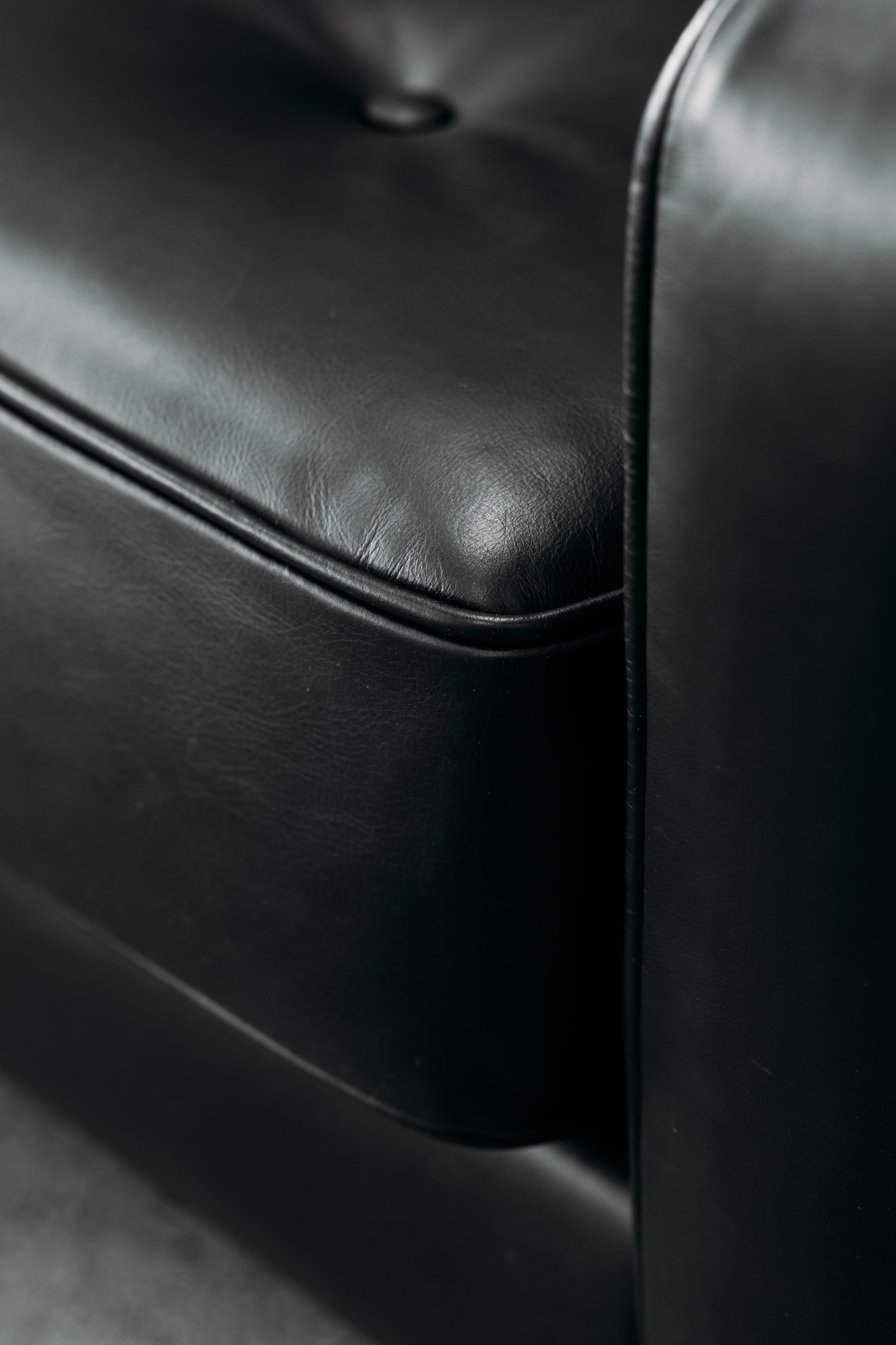 Chanel black leather sofa