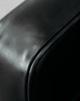 Chanel black leather sofa