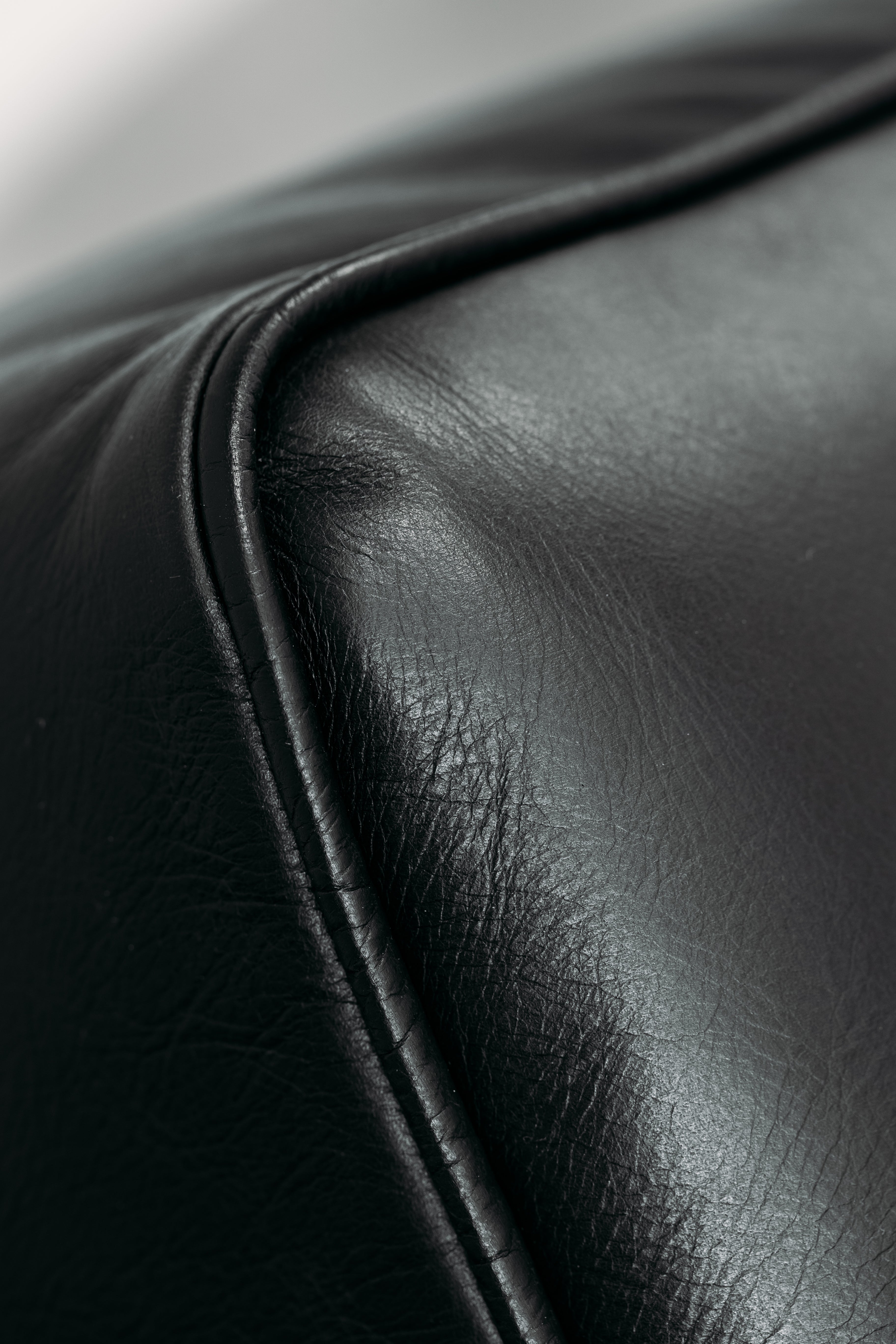 Chanel black leather sofa