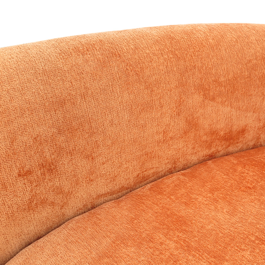 Hendricks curved sofa in Caulfield carrot 