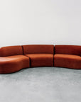 Hendricks Modular curved sofa in ankara terracotta