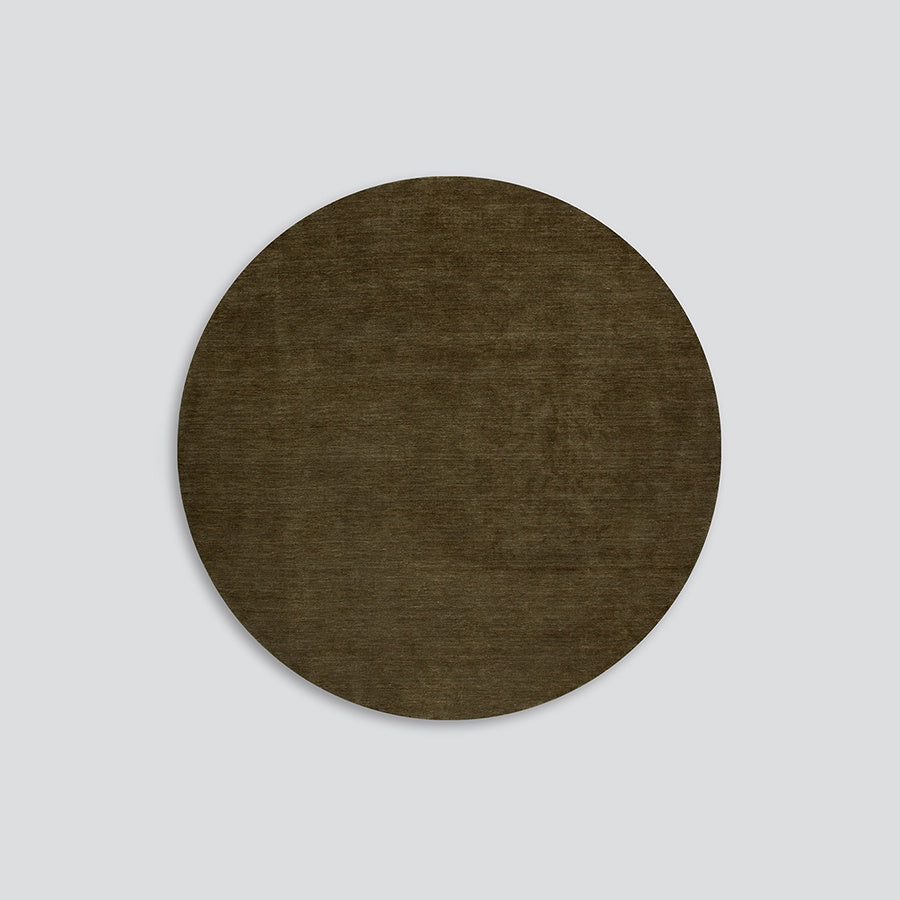 Sandringham round wool rug in moss 