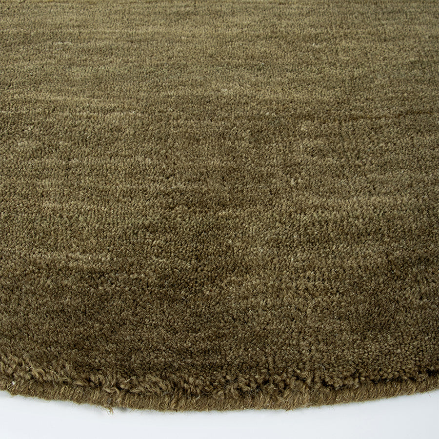 Sandringham round wool rug in moss 