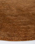 Sandringham round wool rug in Pecan 