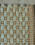 Tappeto jute rug in pale ocean